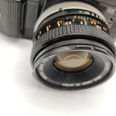 Canon A-1 35mm SLR Film Camera - Black (50mm Lens Kit)