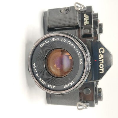 Canon A-1 35mm SLR Film Camera - Black (50mm Lens Kit)